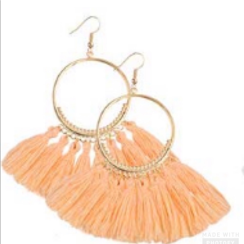 Peachy colored fringe hoops